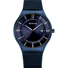 BERING watch with dark blue mesh band and black dial, white numerals and hands, date window at 3 o'clock.