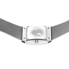 Watch with minimalist rectangular case and mesh band, photographed from behind showing the clasp mechanism and bracelet underside.