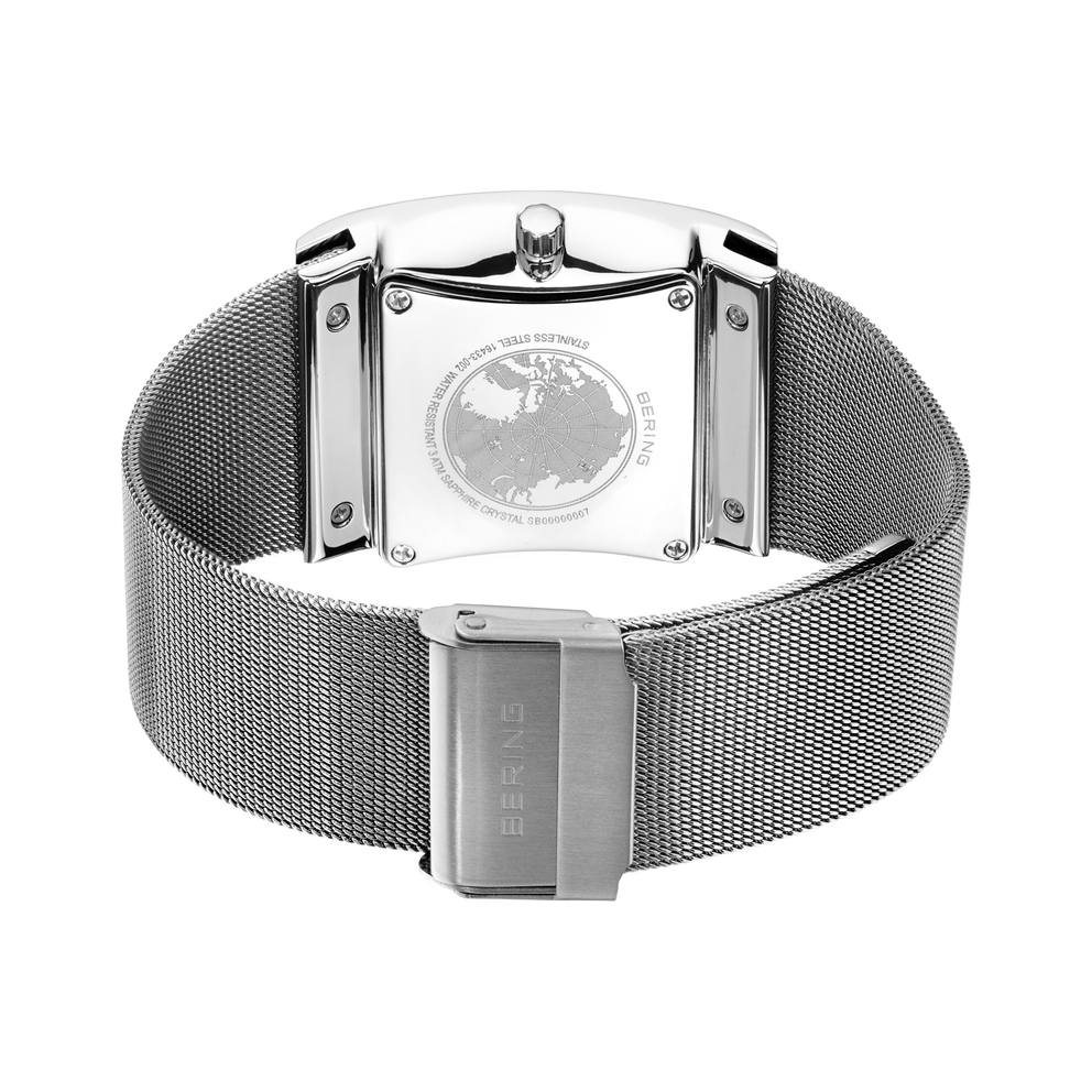 Watch case back with engraved map design and mesh band