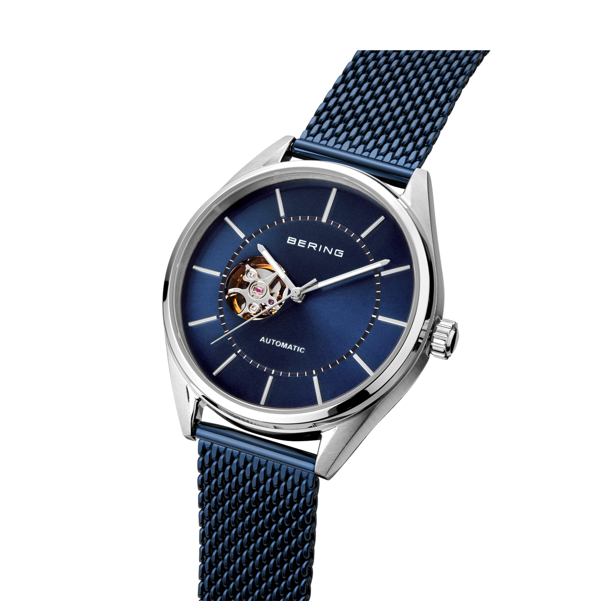 BERING automatic watch with open heart dial and blue mesh bracelet, angled product view.