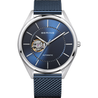 Silver BERING automatic watch with blue dial, white markers, open-heart aperture revealing gold movement, blue mesh strap.