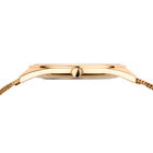Gold wristwatch shown in profile, thin rectangular case with mesh bracelet
