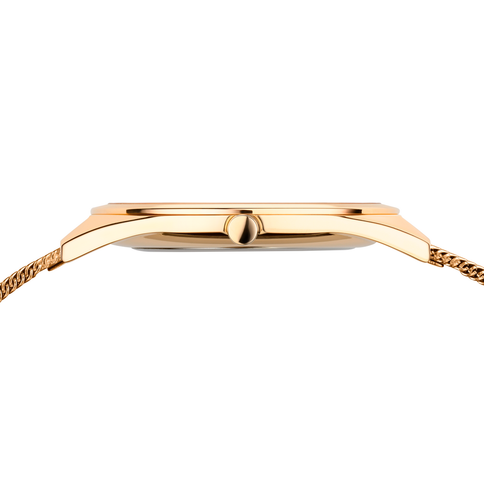 Gold wristwatch shown in profile, thin rectangular case with mesh bracelet