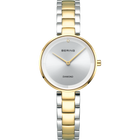 Two-tone BERING watch with white dial, gold hands, and mixed-metal bracelet
