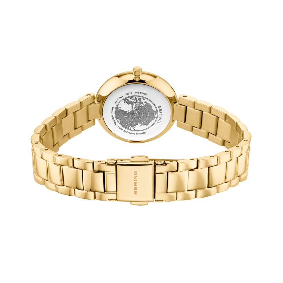 Vista trasera de reloj con pulsera eslabonada dorada, mostrando caja y eslabones.