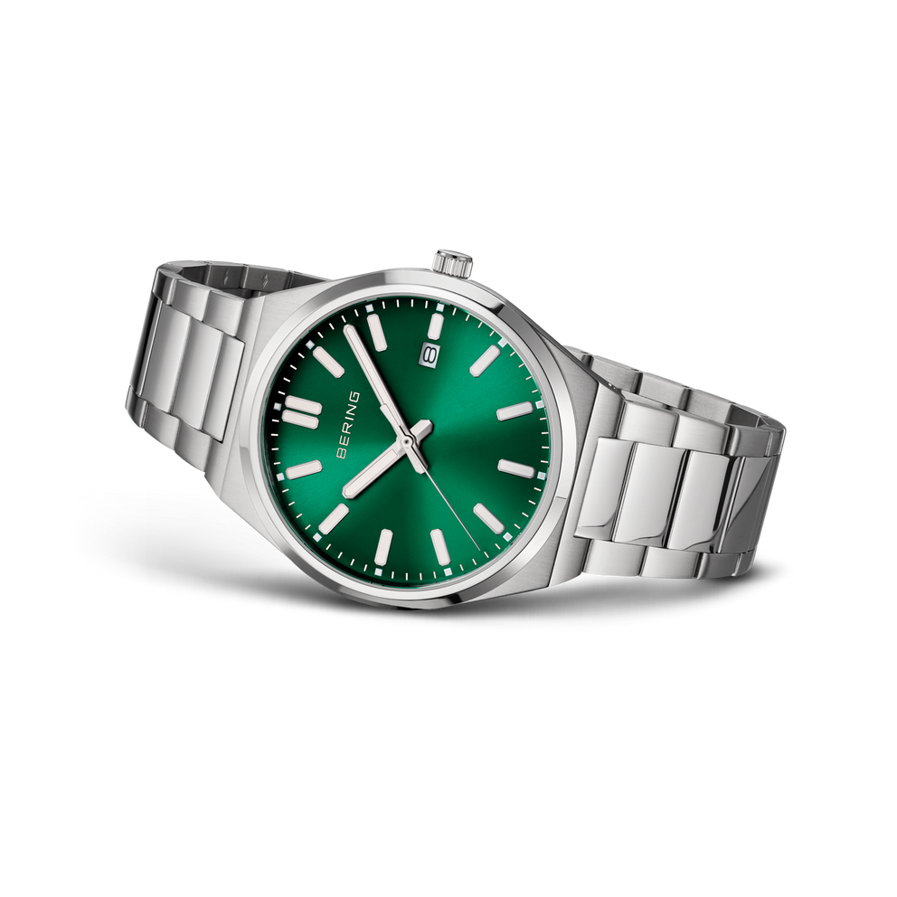 Stainless steel wristwatch with green dial and white indices, shown from the left side.