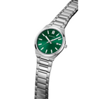 Steel watch with green dial and three-hand movement, angled view highlighting the metal link bracelet.