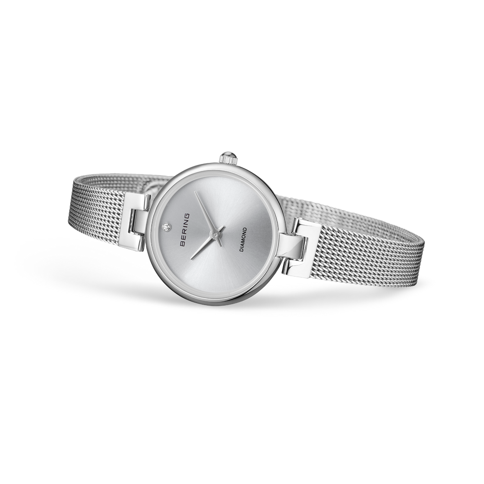 BERING watch with silver mesh band displayed to show face and band detail.
