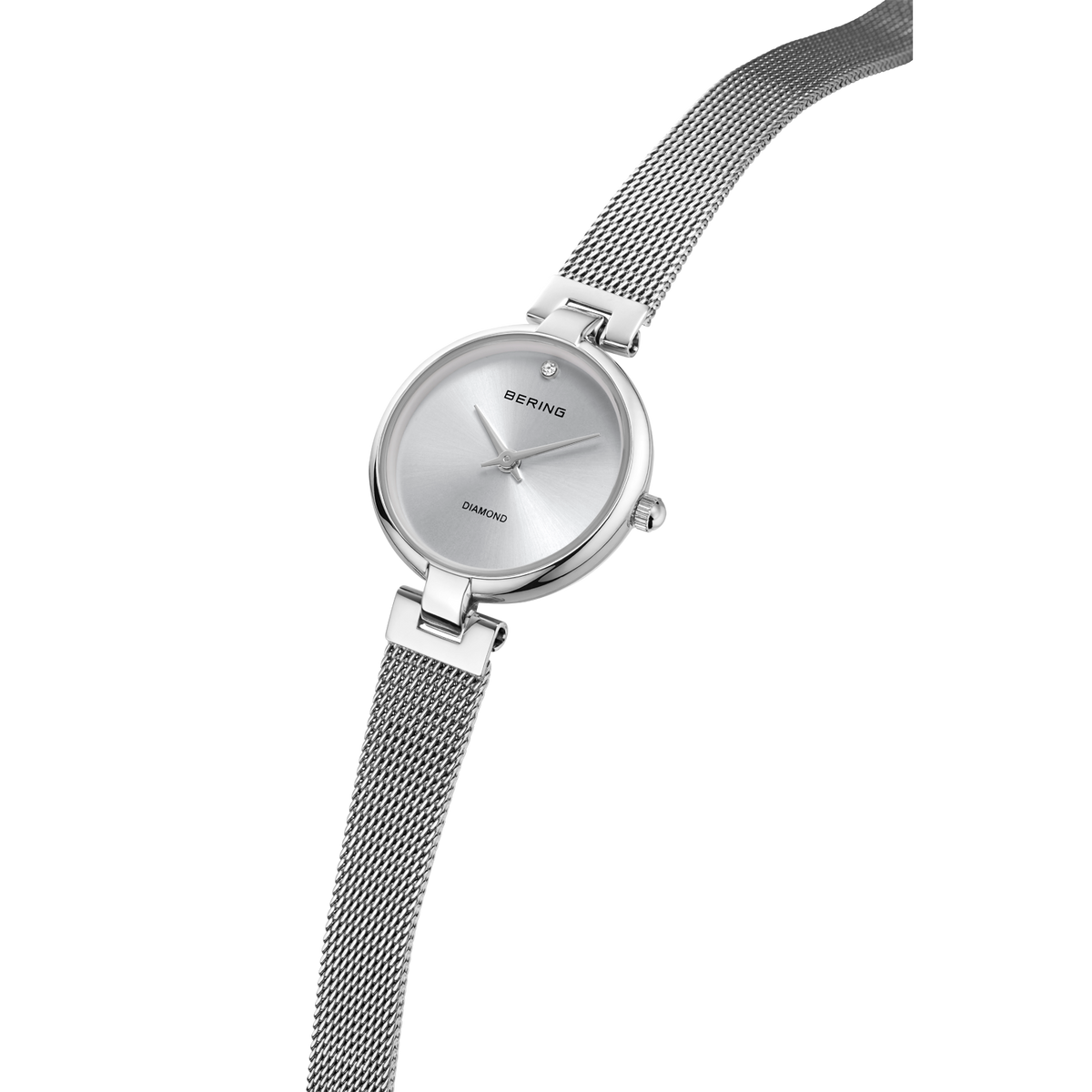 BERING wristwatch with silver dial and woven mesh band, angled view of watch face and bracelet