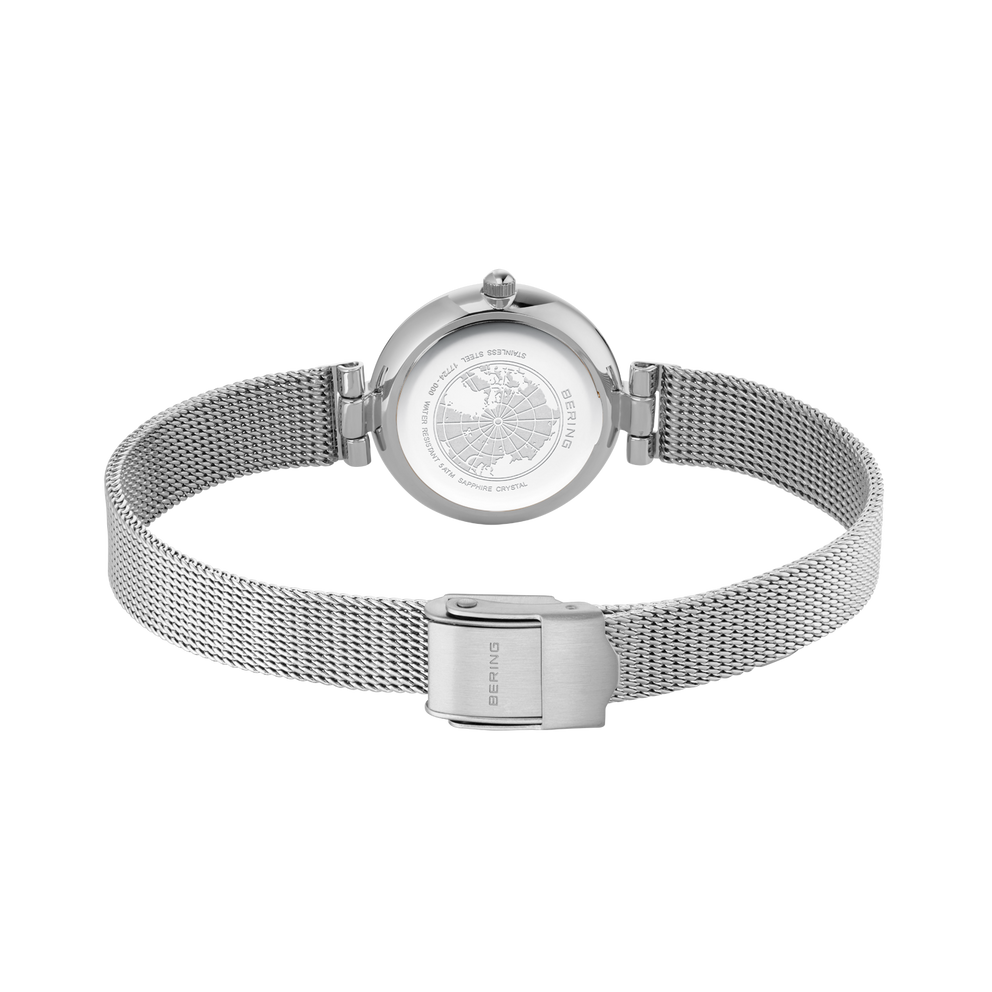 Wristwatch back view showing mesh metal band and rectangular clasp
