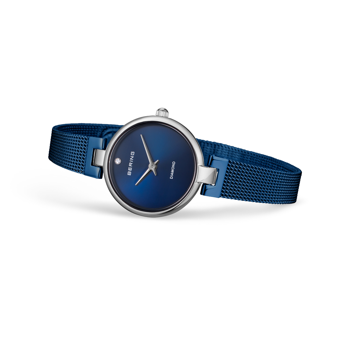 BERING watch model 17724-307 with dark blue dial and stainless steel case, shown at an angle with blue mesh metal band