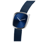 Watch shown at side angle with square silver case, dark blue dial, white hands, and dark blue textured fabric band.