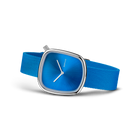 BERING wristwatch 18034-308 with blue square face, silver case, and blue textile strap shown at an angle