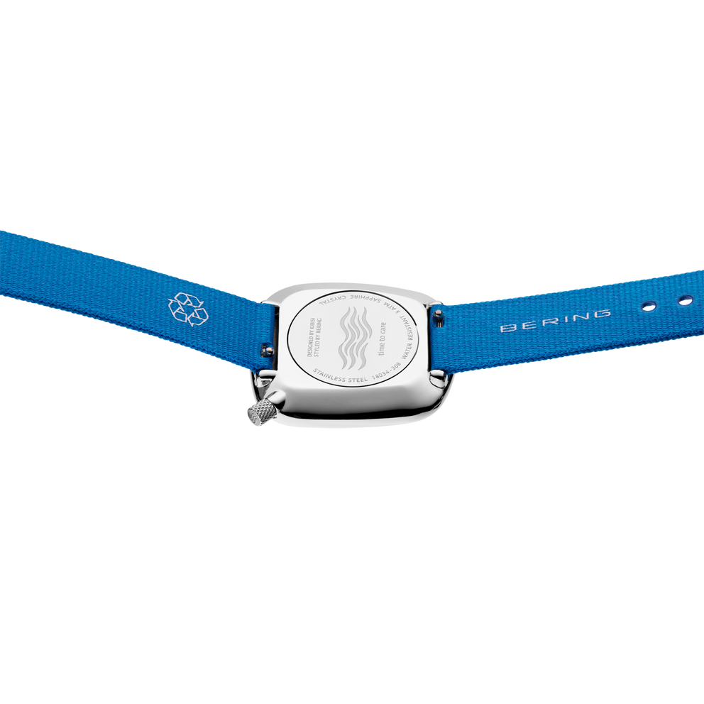 Watch with blue fabric strap featuring BERING logo and silver rectangular case