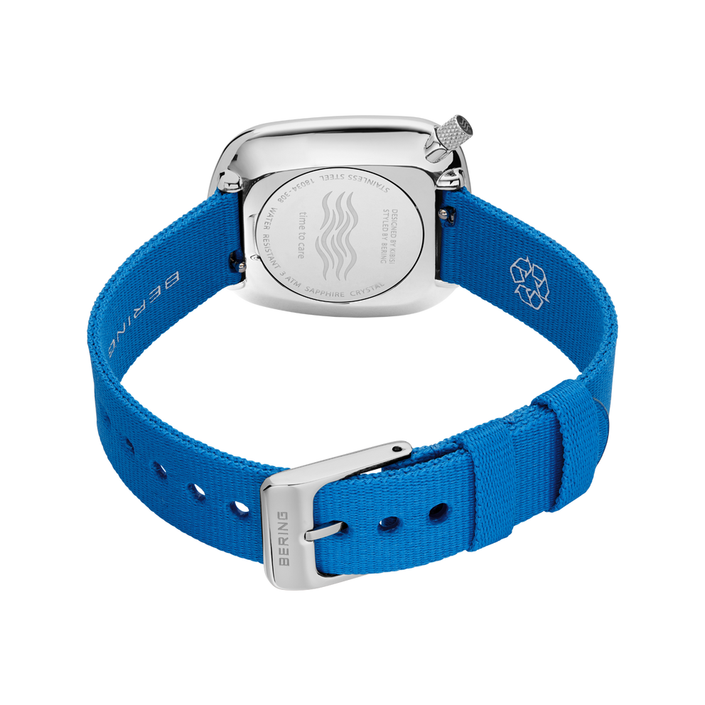Watch back view with silver case and blue fabric strap with metal buckle