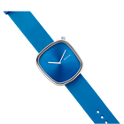 Square-cased BERING wristwatch with blue dial, blue fabric strap shown at an angle