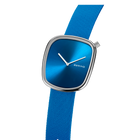 Watch with blue square dial and blue strap, side-angle view