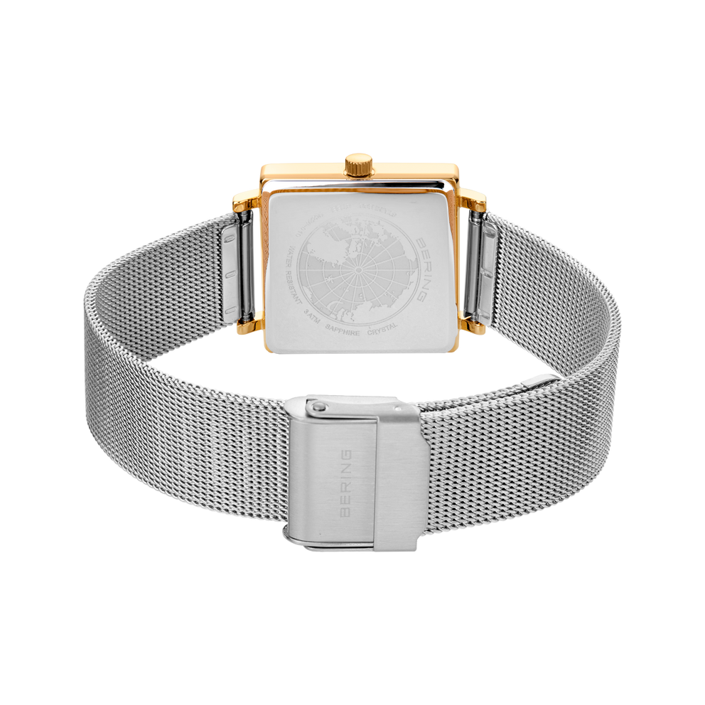 Square case watch with rose gold lugs and silver mesh band, displayed to show the magnetic clasp.