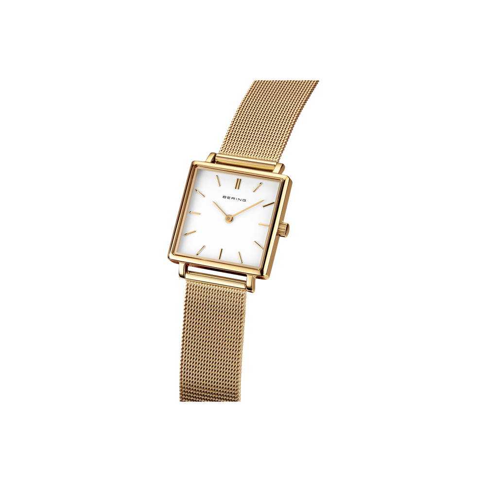 Square-face BERING watch with white dial and gold-tone mesh band, tilted view