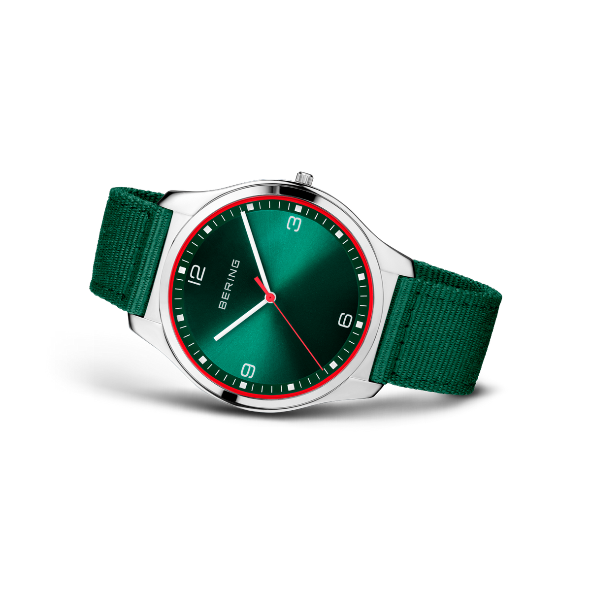 BERING watch with teal dial, red accent ring, silver case, and green textile straps, angled side view
