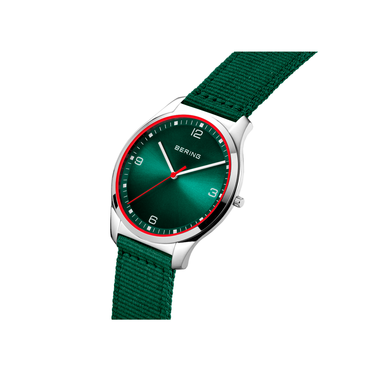 Watch with dark green dial and bezel, silver case, and green fabric strap, photographed at angle