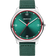 Silver watch with dark teal dial and red bezel, white hands, on green fabric strap