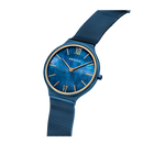 Blue dial wristwatch with Roman numerals and gold accents, dark blue mesh metal band