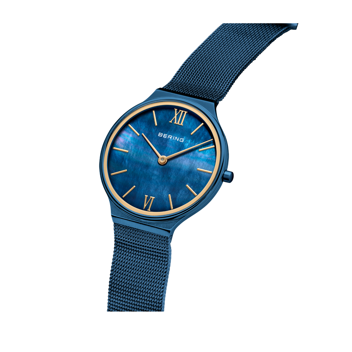 Blue dial wristwatch with Roman numerals and gold accents, dark blue mesh metal band