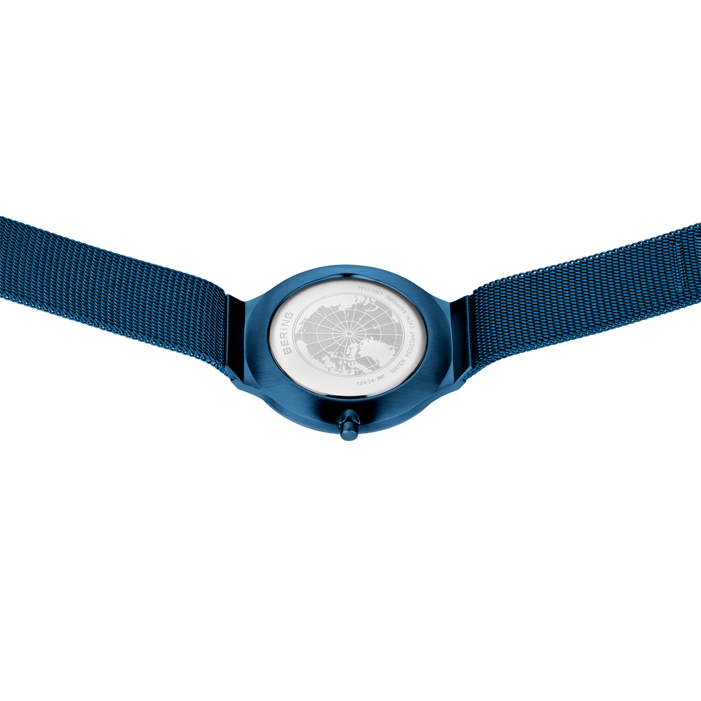 BERING wristwatch with dark blue case and textile strap, viewed from above
