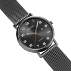 BERING titanium wristwatch with black dial, Arabic numerals, white hands, orange second hand, and gray mesh band