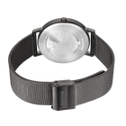 Watch caseback with navigation dial and BERING branding, paired with mesh metal bracelet, photographed from above.