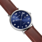 BERING wristwatch with navy blue dial, silver case, white markers, and brown leather strap on white background.