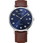 Titanium BERING watch with navy dial, white numerals, date window, silver finish, and brown leather strap.