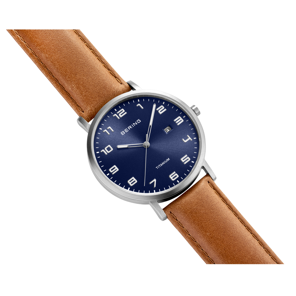 BERING round watch with silver case, navy dial, and brown leather strap shown at an angle