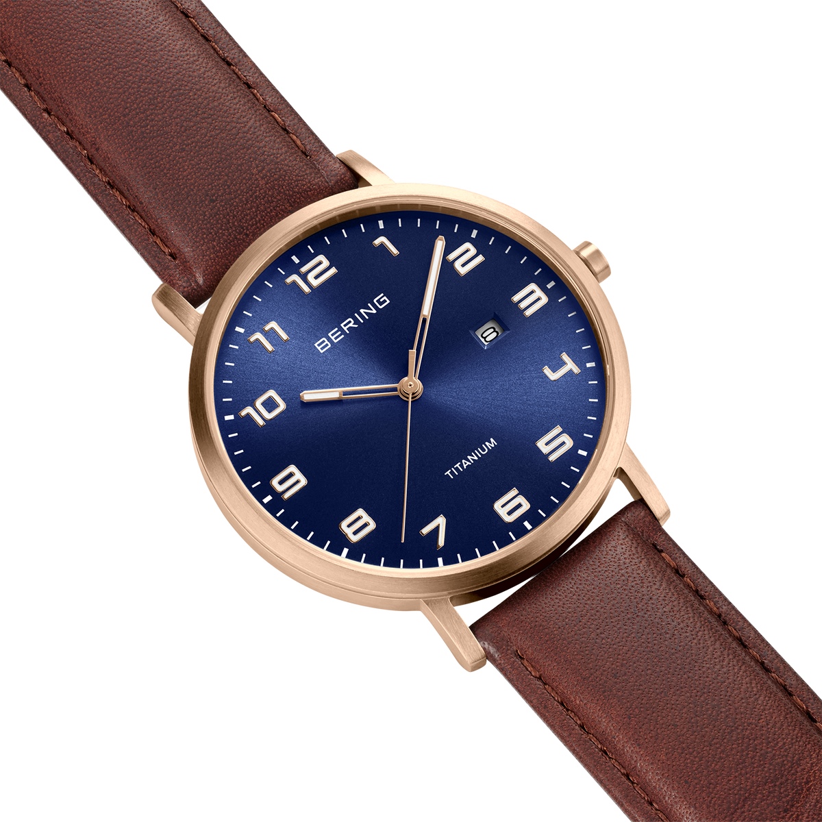 BERING wristwatch with navy dial, rose gold case, and burgundy leather strap, shown at three-quarter angle.