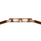 Watch side profile with rose gold case, dark dial, and brown leather strap
