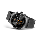 BERING kronografisk armbåndsur med sort skive, tre orange-aksent-underskive og mesh-metalrem.