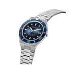Silver-link bracelet and dial detail of BERING wristwatch with blue bezel