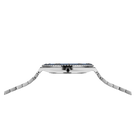 Silver watch with dark blue bezel, shown from side angle with segmented metal bracelet.