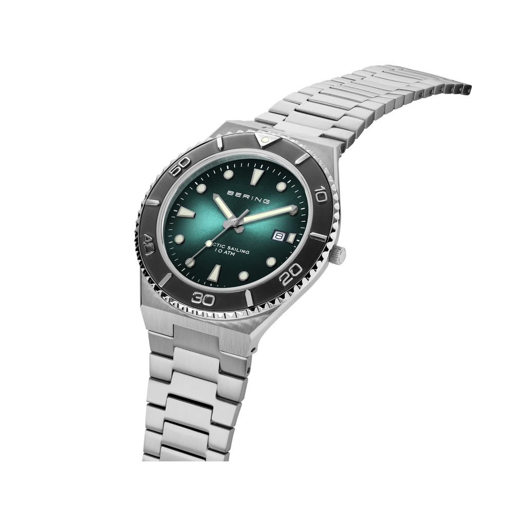 Orologio acciaio inox con quadrante turchese satinato, lunetta nera e braccialetto, vista laterale